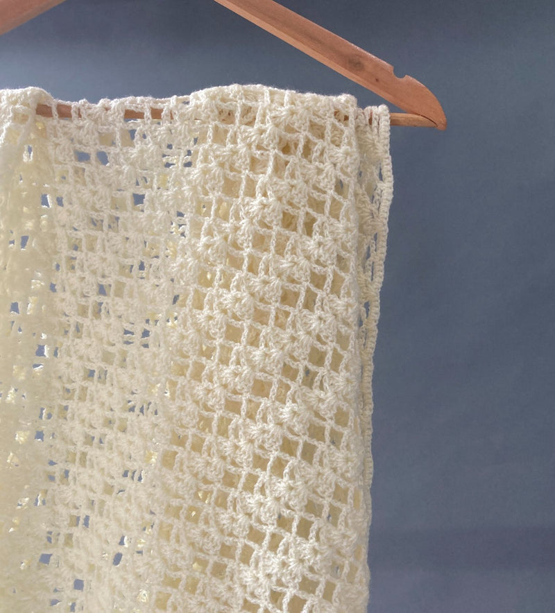 Cream crocheted shawl